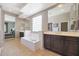 Elegant bathroom with double vanity and soaking tub at 28957 N 70Th Dr, Peoria, AZ 85383