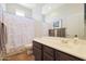 Clean bathroom with shower/tub combo and updated vanity at 28957 N 70Th Dr, Peoria, AZ 85383