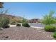 Neatly landscaped front yard with gravel and desert plants at 28957 N 70Th Dr, Peoria, AZ 85383