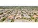 Aerial view of the house and surrounding neighborhood, showing pool and basketball court at 2915 E Constance Way, Phoenix, AZ 85042