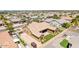 Aerial view showcasing the home's backyard, landscaping, and surrounding properties at 2915 E Constance Way, Phoenix, AZ 85042