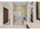 Spa-like bathroom with a large shower and built-in seat at 2915 E Constance Way, Phoenix, AZ 85042