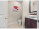 Elegant powder room with modern vanity and toilet at 2915 E Constance Way, Phoenix, AZ 85042