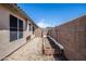 Backyard with raised garden bed and block wall at 3127 W Folgers Rd, Phoenix, AZ 85027