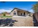 Backyard features a large patio and gravel landscaping at 3127 W Folgers Rd, Phoenix, AZ 85027