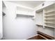 Large walk-in closet with ample shelving and hanging space at 3127 W Folgers Rd, Phoenix, AZ 85027