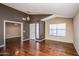 Bright living room with hardwood floors and a view of the entryway at 3127 W Folgers Rd, Phoenix, AZ 85027