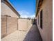 Side yard with storage shed and gravel at 3127 W Folgers Rd, Phoenix, AZ 85027