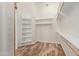 Spacious walk-in closet with ample shelving and hanging space at 32032 N 52Nd Way, Cave Creek, AZ 85331