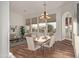 Sunlit dining room with hardwood floors and large windows at 32032 N 52Nd Way, Cave Creek, AZ 85331