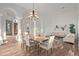 Spacious dining area with hardwood floors and a chandelier at 32032 N 52Nd Way, Cave Creek, AZ 85331