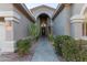 Elegant entryway with tile flooring and desert plants at 32032 N 52Nd Way, Cave Creek, AZ 85331