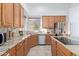 Spacious kitchen featuring granite countertops and oak cabinets at 32032 N 52Nd Way, Cave Creek, AZ 85331