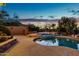 Luxury pool and spa with surrounding landscaping and desert plants at 32032 N 52Nd Way, Cave Creek, AZ 85331