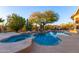 Luxury pool and spa with a built in waterfall feature at 32032 N 52Nd Way, Cave Creek, AZ 85331