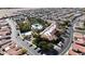 Aerial view of community with pool, tennis courts, and clubhouse at 3301 S Goldfield Rd # 4086, Apache Junction, AZ 85119