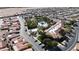 Aerial view of community with pool, tennis courts, and clubhouse at 3301 S Goldfield Rd # 4086, Apache Junction, AZ 85119