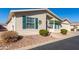 Tan home with green shutters and a two-car garage at 3301 S Goldfield Rd # 4086, Apache Junction, AZ 85119