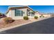 Single story home with a carport and desert landscaping at 3301 S Goldfield Rd # 4086, Apache Junction, AZ 85119