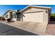 Exterior view of the home and driveway at 3301 S Goldfield Rd # 4086, Apache Junction, AZ 85119