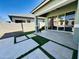 Artificial turf and flagstone patio, modern backyard at 3448 E Spring Wheat Ln, Gilbert, AZ 85296