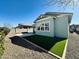 House exterior and artificial turf backyard at 3448 E Spring Wheat Ln, Gilbert, AZ 85296