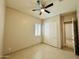 Light and airy bedroom, complete with ceiling fan and closet at 3448 E Spring Wheat Ln, Gilbert, AZ 85296