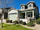 Two story light sage home with a three car garage at 3448 E Spring Wheat Ln, Gilbert, AZ 85296