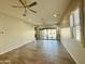 Bright living room with sliding glass doors leading to the backyard at 3448 E Spring Wheat Ln, Gilbert, AZ 85296