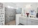 Bathroom with double vanity, large shower, and gray tile at 3519 E Red Oak Ln, Gilbert, AZ 85297