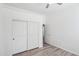 Bedroom with sliding door closet and ceiling fan at 3519 E Red Oak Ln, Gilbert, AZ 85297