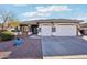 Two-car garage and front yard landscaping at 3519 E Red Oak Ln, Gilbert, AZ 85297