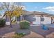 Gray house with two-car garage and manicured landscaping at 3519 E Red Oak Ln, Gilbert, AZ 85297