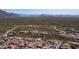 Aerial view of a homesite with mountain views in a desert residential area at 4215 S Willow Springs Trl, Gold Canyon, AZ 85118