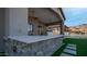 Outdoor kitchen featuring a built-in BBQ area, and easy access to the pool with beautiful desert landscape views at 4215 S Willow Springs Trl, Gold Canyon, AZ 85118