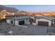 Beautiful desert home featuring a neutral color palette, paver driveway, and mountain views at 4215 S Willow Springs Trl, Gold Canyon, AZ 85118
