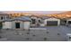 Desert home exterior featuring a paver driveway, stone accents, and desert landscaping at 4215 S Willow Springs Trl, Gold Canyon, AZ 85118