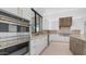 Gourmet kitchen featuring stainless steel appliances, white cabinetry, and a kitchen island at 4215 S Willow Springs Trl, Gold Canyon, AZ 85118