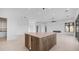 Spacious kitchen island with elegant countertop and ample storage, illuminated by modern lighting at 4215 S Willow Springs Trl, Gold Canyon, AZ 85118