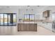 Bright kitchen with a kitchen island, stainless steel appliances, and mountain views at 4215 S Willow Springs Trl, Gold Canyon, AZ 85118