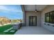 Inviting outdoor kitchen featuring stone accents, a built-in grill, and a scenic desert backdrop at 4215 S Willow Springs Trl, Gold Canyon, AZ 85118