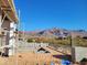 Under construction pool; concrete structure, mountain views in background at 4215 S Willow Springs Trl, Gold Canyon, AZ 85118