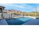 Beautiful backyard pool with mountain views providing a serene outdoor living space at 4215 S Willow Springs Trl, Gold Canyon, AZ 85118