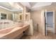 Modern bathroom with a unique sink design and stone tile at 4430 E Graythorn St, Phoenix, AZ 85044