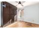 Cozy bedroom with a large wardrobe and cork flooring at 4430 E Graythorn St, Phoenix, AZ 85044