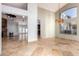 Bright dining room with large window and chandelier at 4430 E Graythorn St, Phoenix, AZ 85044