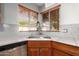 Kitchen corner sink with stainless steel appliances at 4430 E Graythorn St, Phoenix, AZ 85044