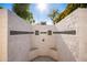 Convenient outdoor shower with stone tile at 4430 E Graythorn St, Phoenix, AZ 85044