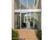 Modern entryway with glass doors offering a view into the living area at 4666 N 40Th St, Phoenix, AZ 85018