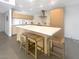 Modern kitchen with light wood cabinets and a large island at 4666 N 40Th St, Phoenix, AZ 85018